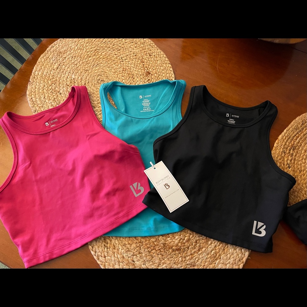Three Buffbunny tanks size small